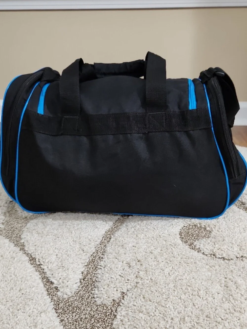 Adidas Black Duffel Bag with Bright Blue Accents